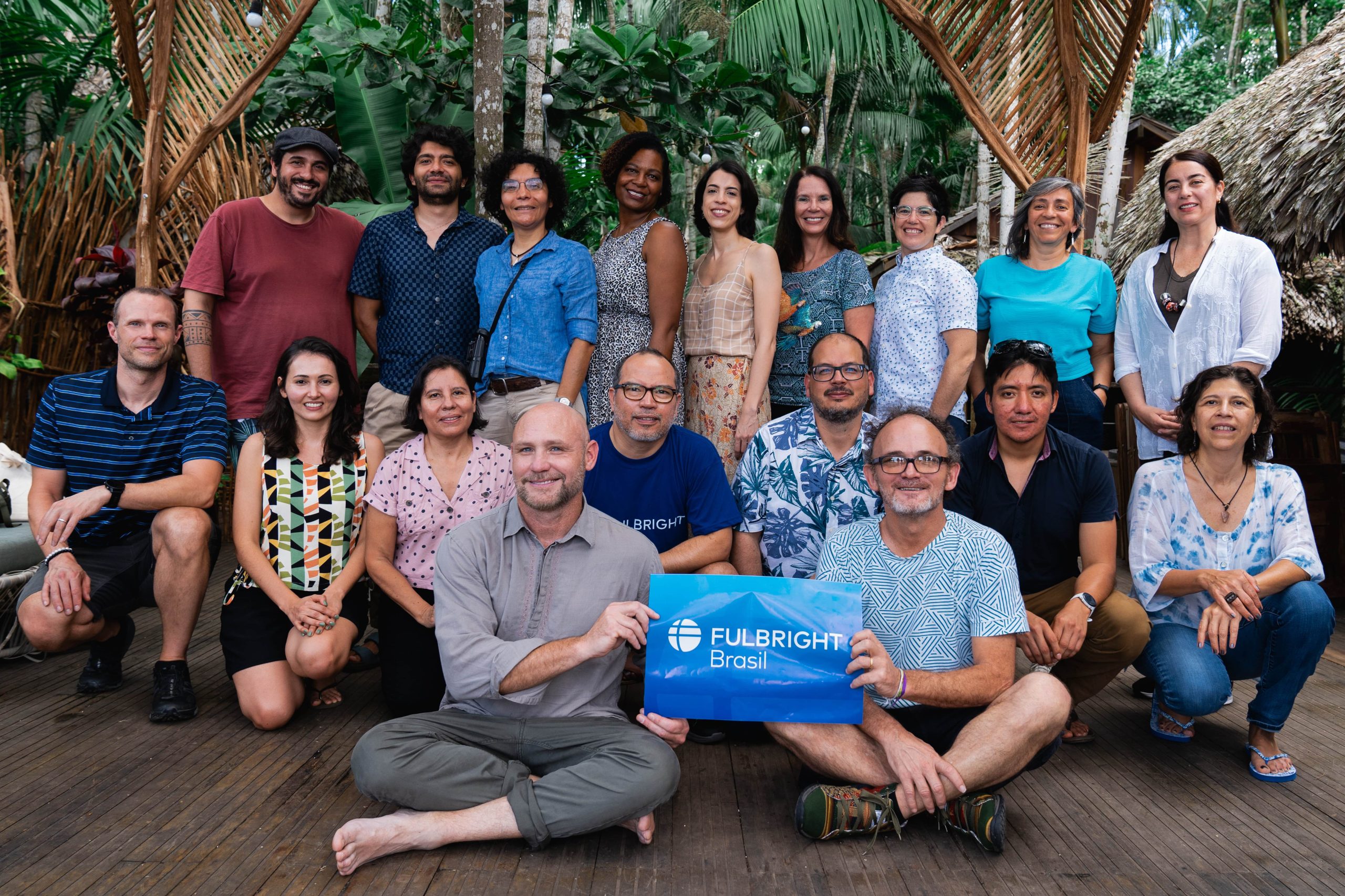 Scholars from the fulbright amazonia in Belem, Para, Brazil, hold a fulbright brazil banner